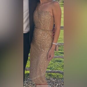 Beautiful cocktail dress for sale. Gold and nude colors. Size small.